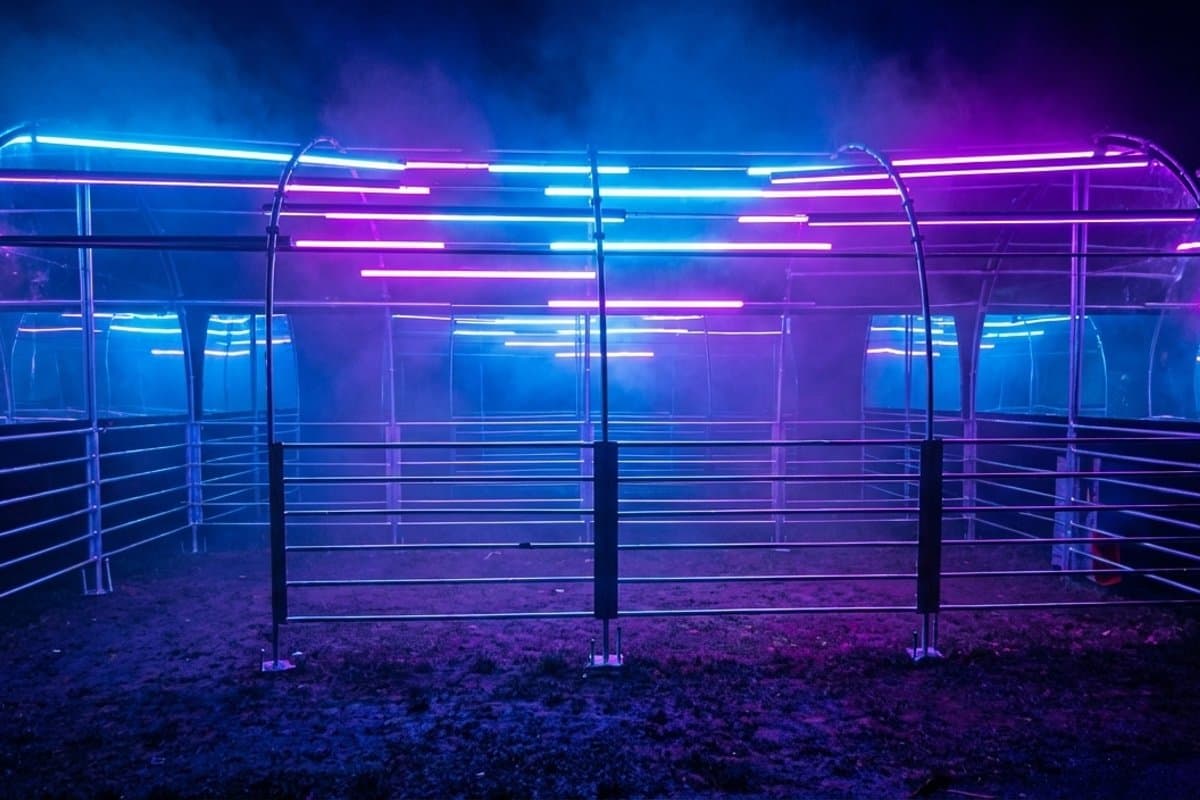 LED art installation with illuminated arch structure using pixel profiles