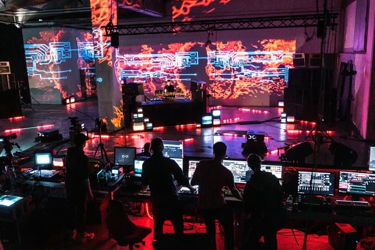 Live production stage with projection mapping and lighting control setup